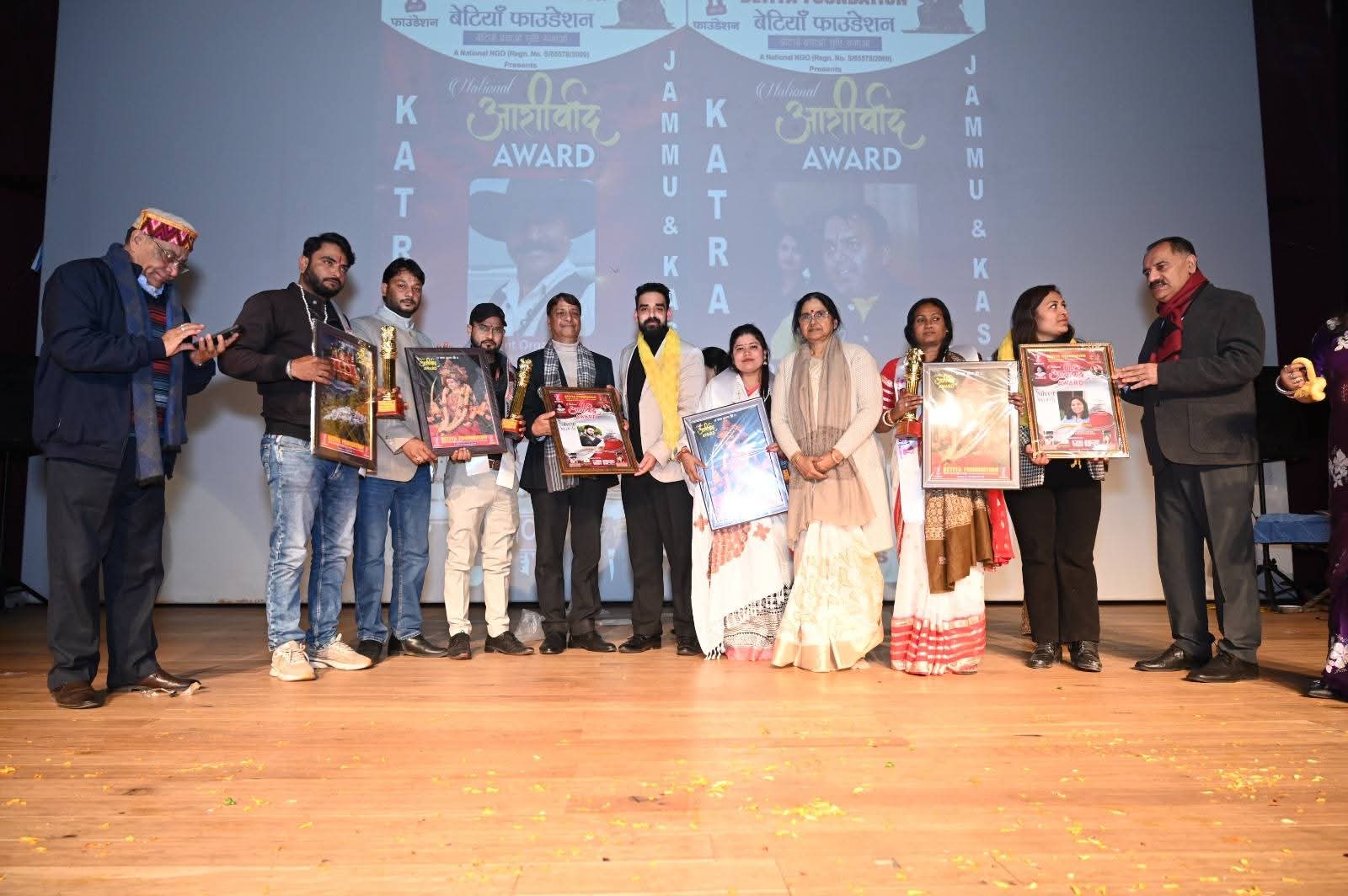 Celebrating excellence: Honorees proudly display their accolades at the National Aashirwad Awards held in Katra, Jammu & Kashmir, honoring remarkable achievements.